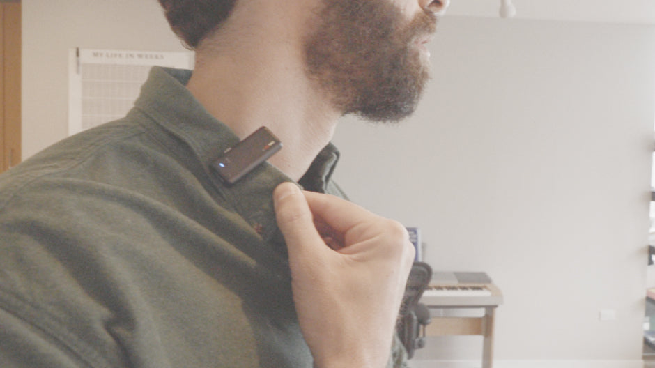 a man adjusting his collar